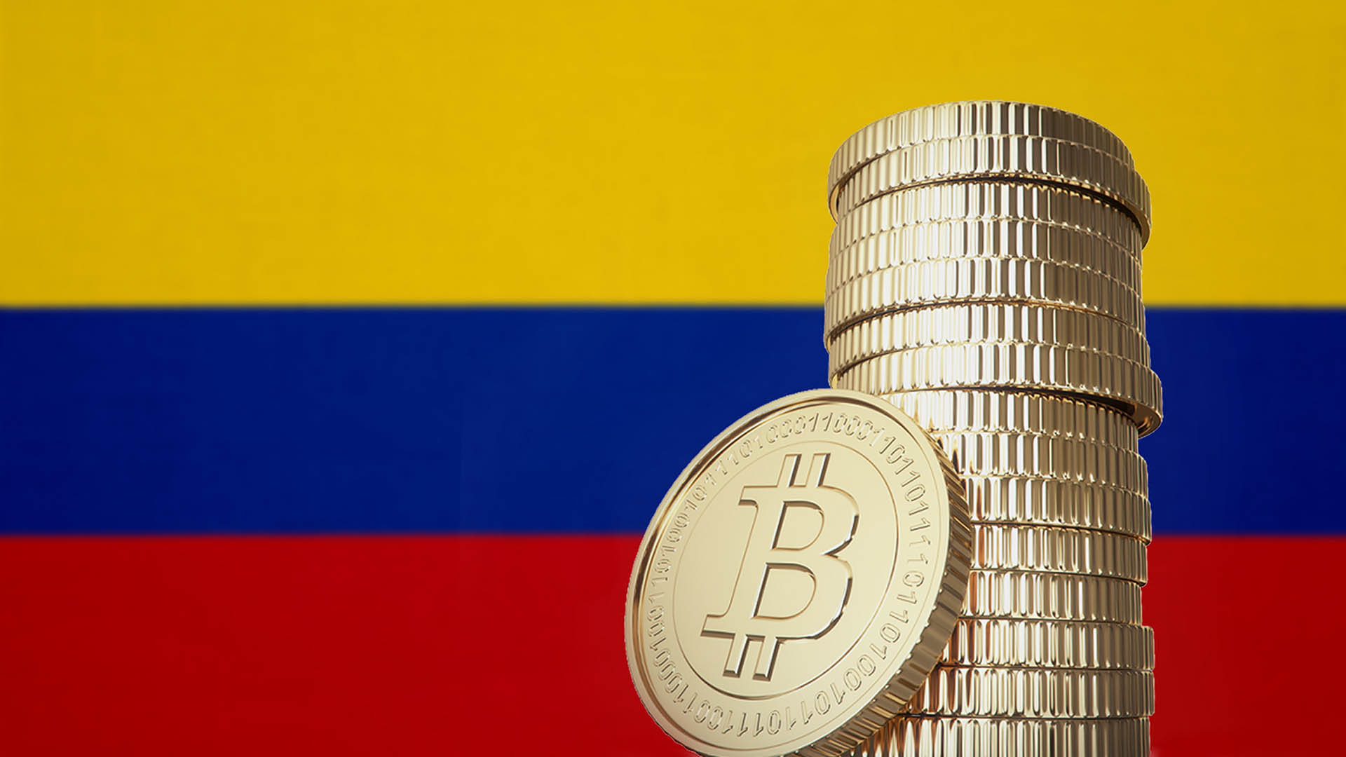 Bitcoin stack with Colombia flag in the background